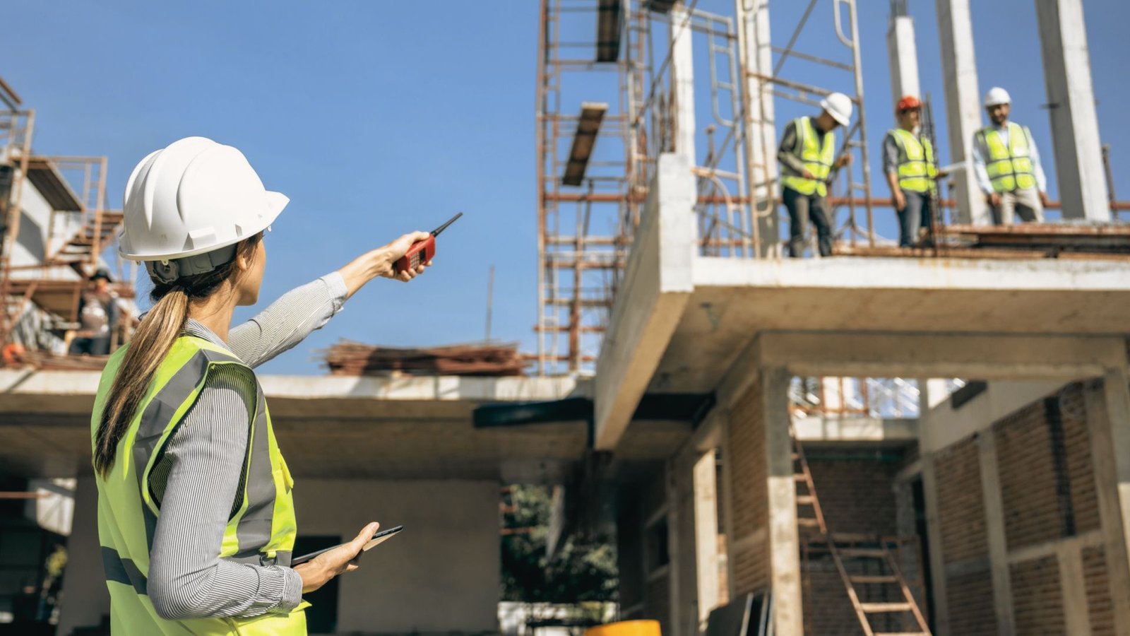 Commercial construction professionals working together on site.