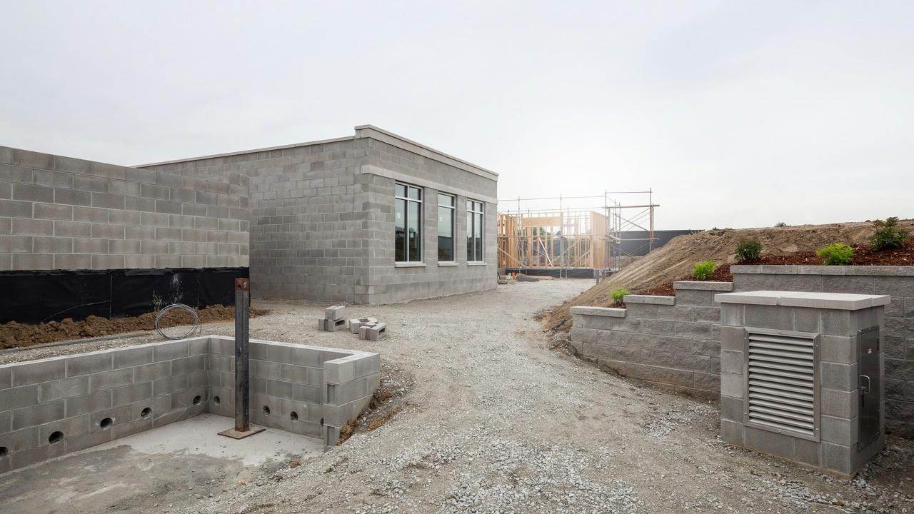 CMU walls used in residential foundations, commercial buildings, basements, retaining walls, and utility enclosures.