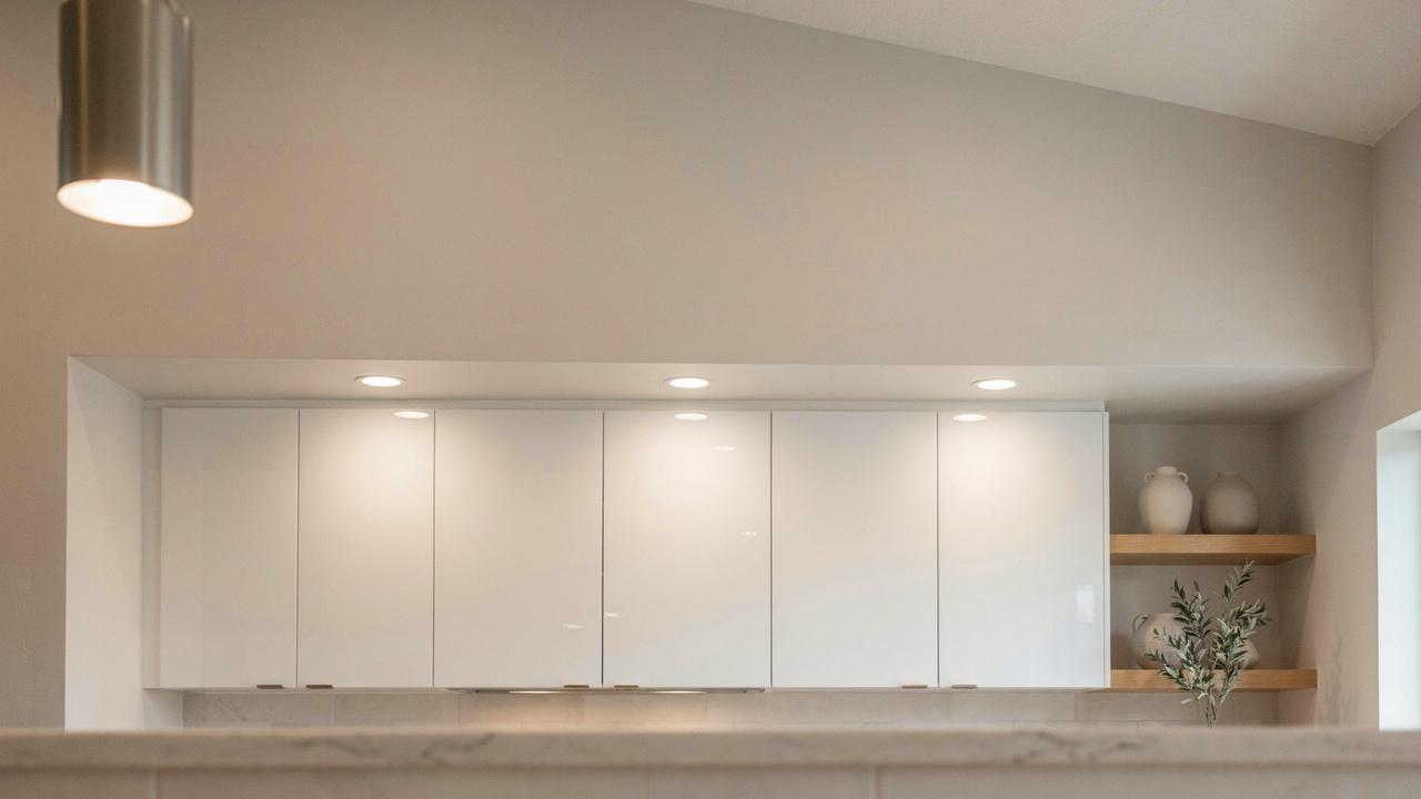 Interior architectural bulkhead above kitchen cabinets.