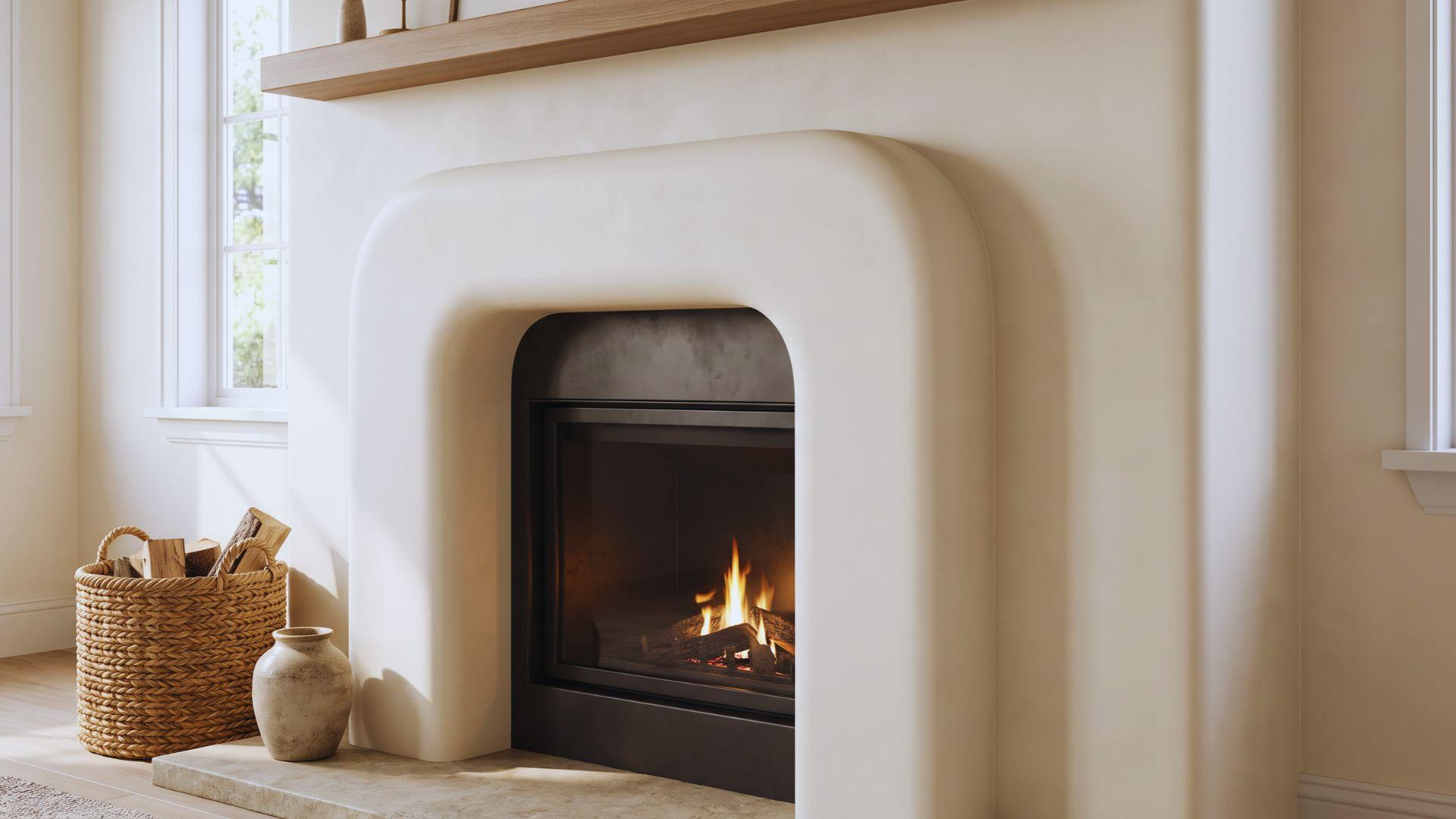 Smooth plaster fireplace surround with a rounded arch and curved edges.